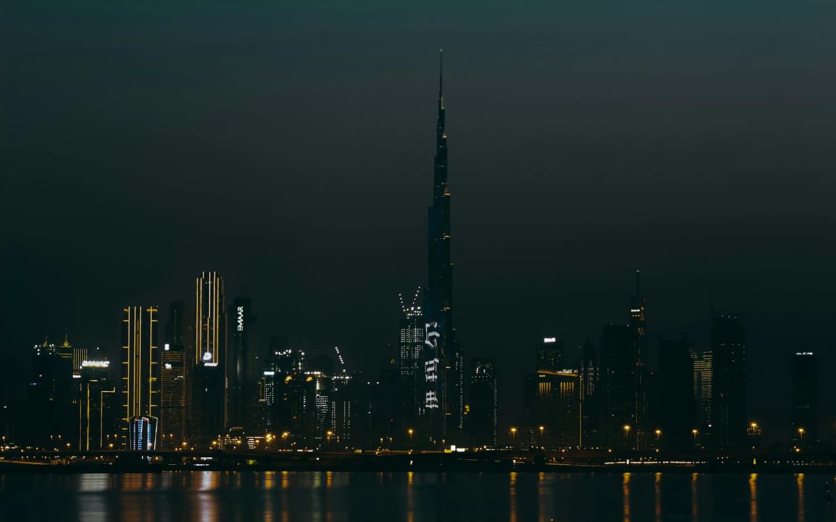 Dubai skyline at night seen across the water
